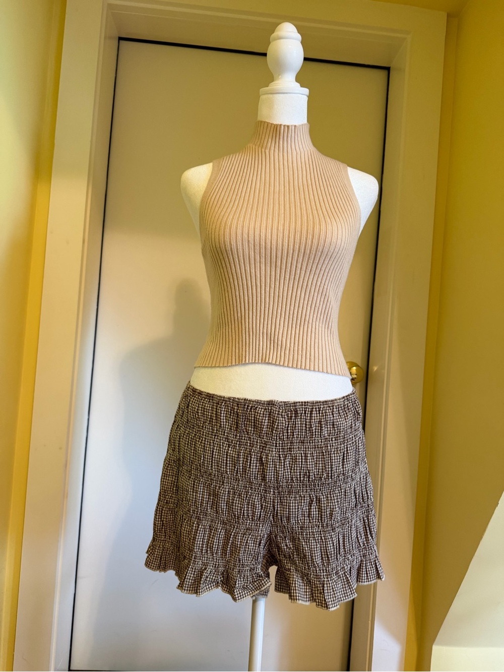 Open back tan ribbed sleeveless mock neck #isabellescabinet